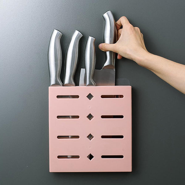 Adhesive knife holder